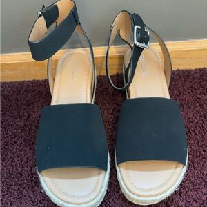 Brand new never worn black wedge sandals